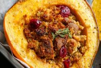 Maple Kissed Acorn Squash with Hearty Vegan Cornbread Sausage Filling