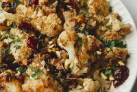 Rosemary Roasted Cauliflower with Pistachio-Cranberry Crunch and Creamy Cashew Sauce