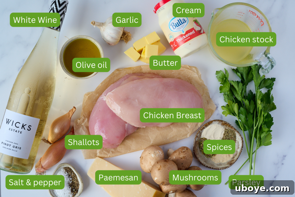 Shot of ingredients laid out onto table. Ingredients in image include white wine, olive oil, shallots, salt and pepper, garlic, butter, chicken breast, parmesan, mushrooms, spices, parsley, chicken stock and cream