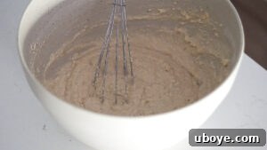 Effortless Plant-Based Waffle Perfection 10 Close-up of vegan waffle batter ready to be cooked