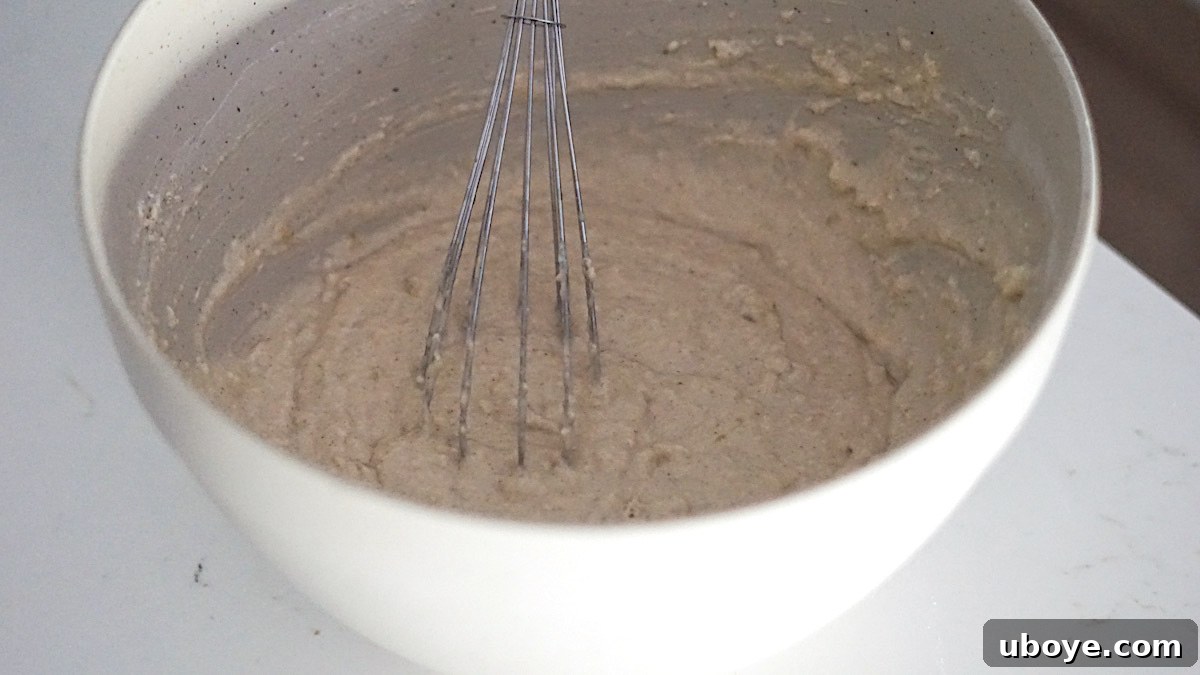 Effortless Plant-Based Waffle Perfection 6 Another view of the lumpy vegan waffle batter in a bowl