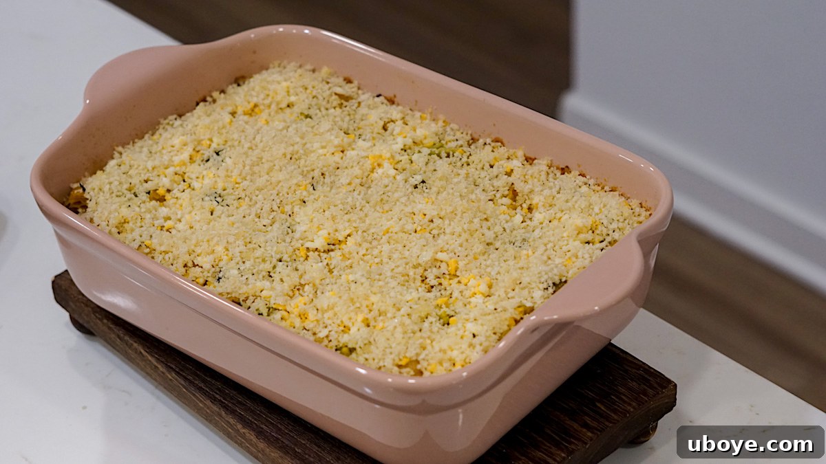 Hearty Plant-Based Broccoli Cheddar Bake 7 Baked casserole with melted vegan cheese on top