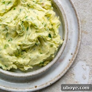 A vibrant close-up of the finished homemade garlic butter, ready for use.