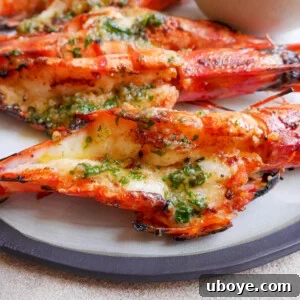 Garlic-Butter-BBQ-Prawns, sizzling on the grill.