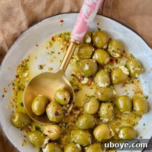 Warm Feta Stuffed Olives, a simple yet impressive appetizer for dinner parties