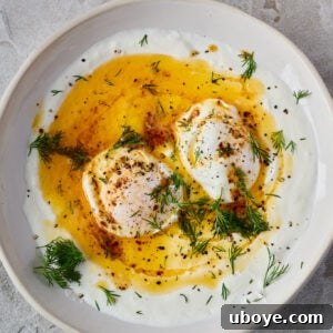 Turkish Eggs (Çilbir) with perfectly poached eggs on garlic yogurt and sizzling chili butter