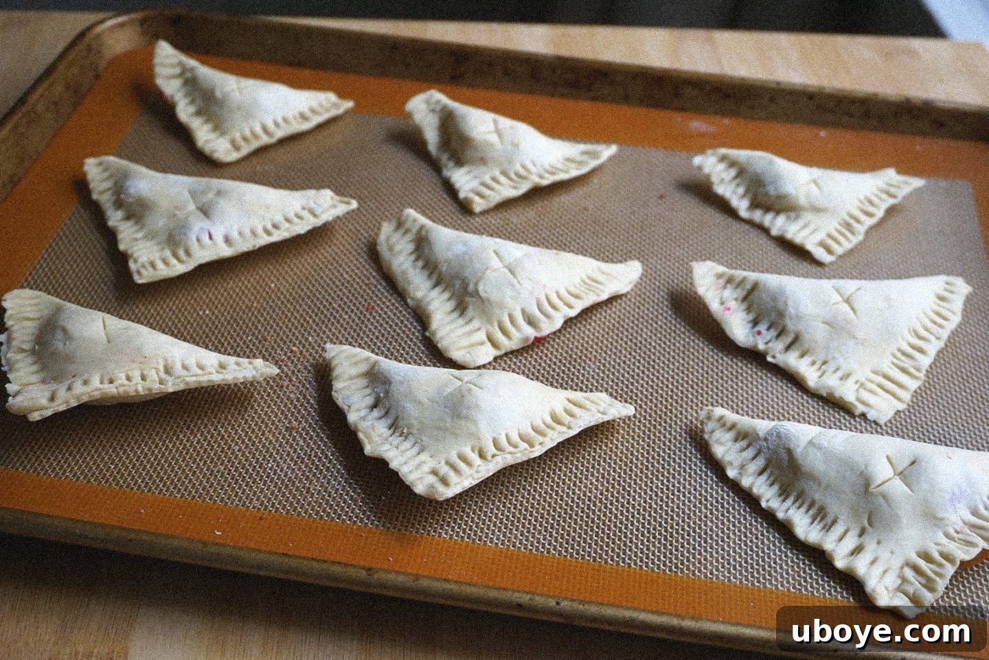 Simple Flaky PBJ Hand Pies 7 Close-up of baked vegan peanut butter and jelly turnovers