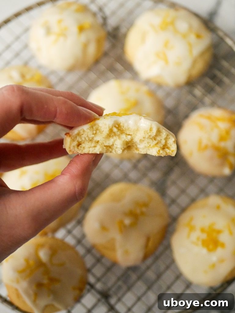 Close-up of lemon olive oil cookies with a luscious lemon drizzle