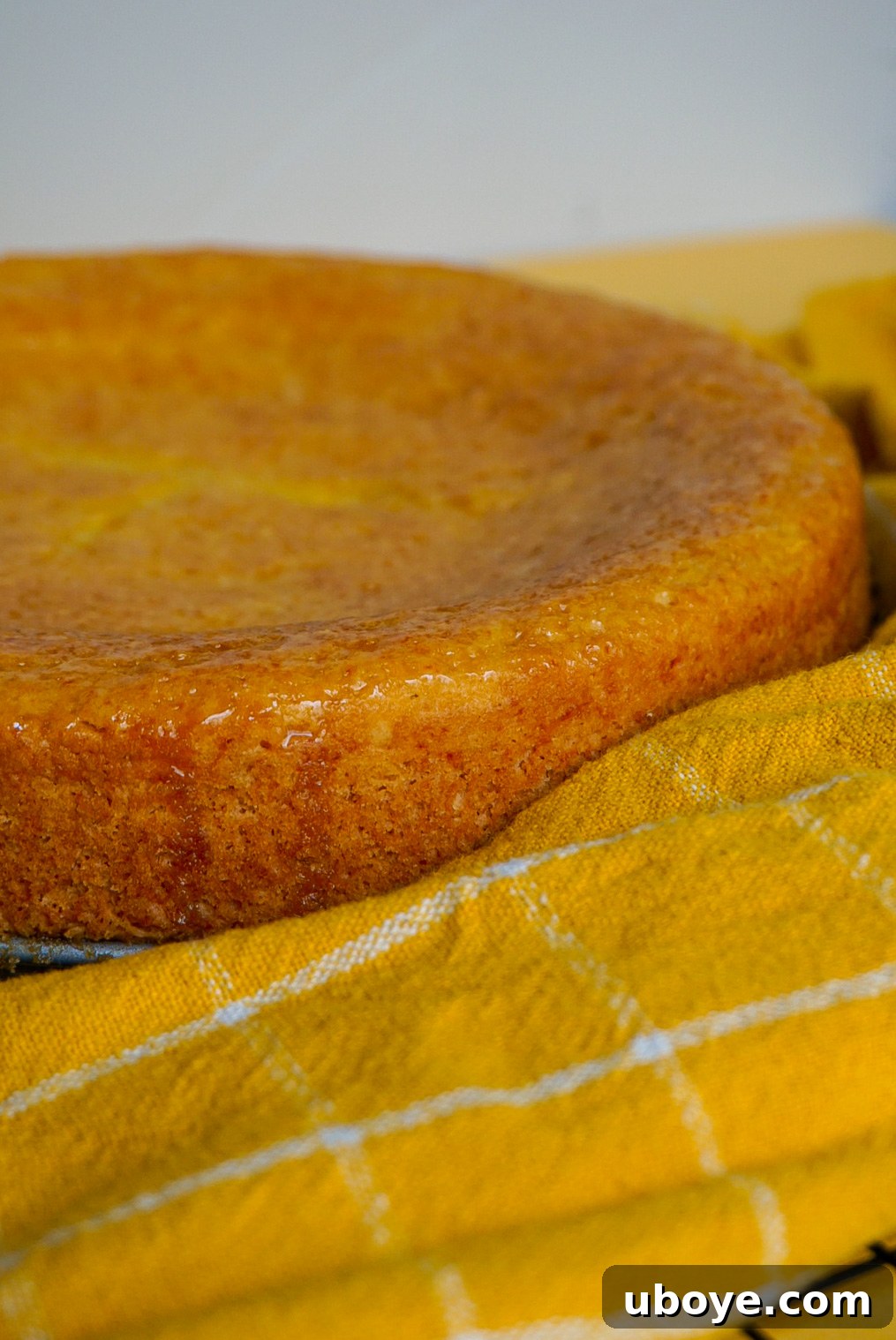 Top-down view of the Pear-a-Sprite vegan cake, showing the artful arrangement of fruit.