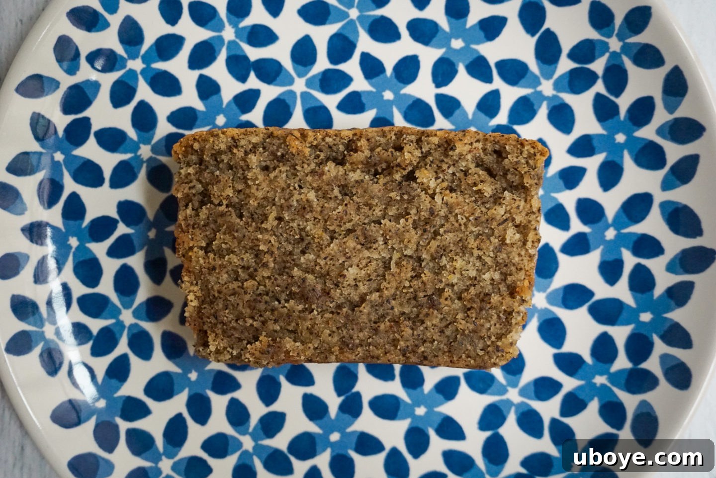 Vegan Earl Grey tea cake served on a plate with tea