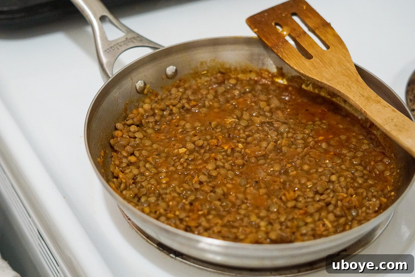 Dill Pickle Plant-Based Beef Tacos 5 Lentil taco meat simmering in a pan on the stovetop, absorbing delicious spices and liquid