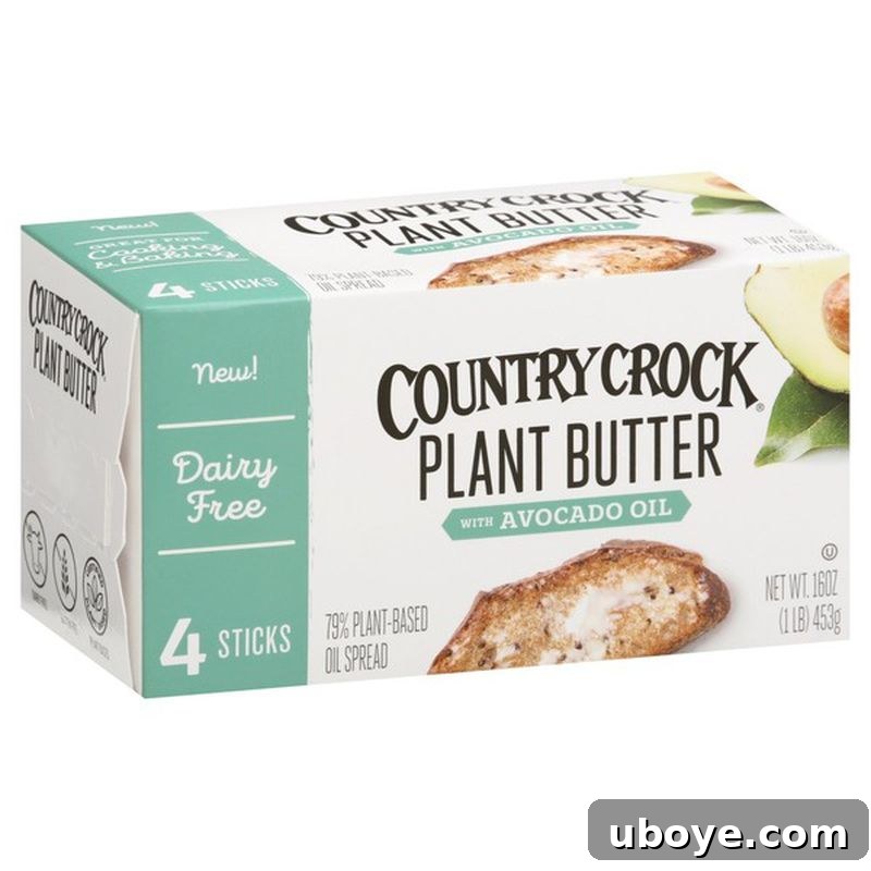 Vegan Box Cake Hack 4 Packs of vegan butter sticks, showcasing modern dairy-free alternatives.