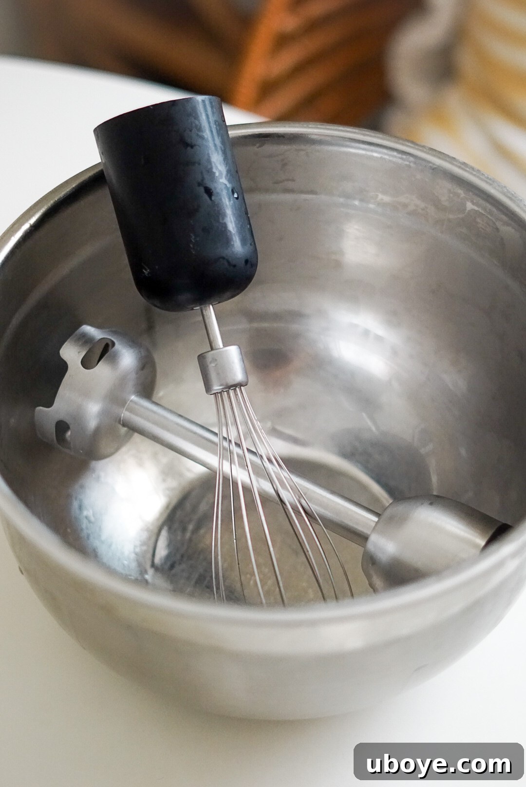 Ingredients for coconut whipped cream, including a can of full-fat coconut milk and a bowl, ready for preparation.