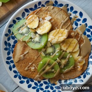 Tropical Vacation Vegan Mango Pancakes, a delicious plant-based breakfast recipe.
