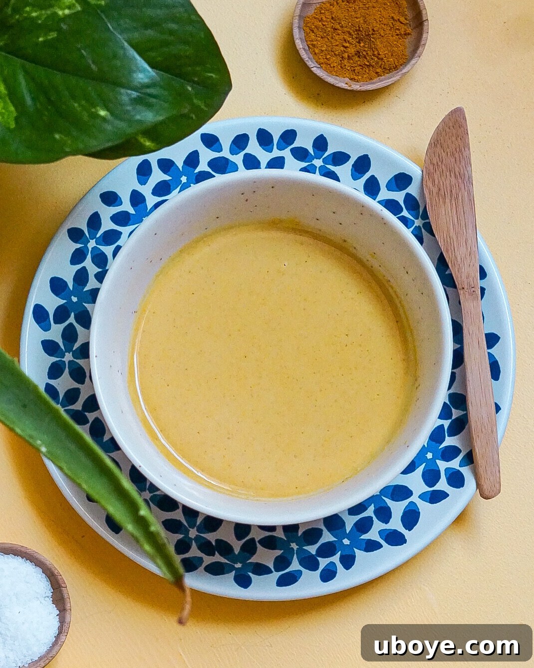 Liquid Gold Tahini 3 Close-up of golden tahini sauce in a bowl, showcasing its creamy texture