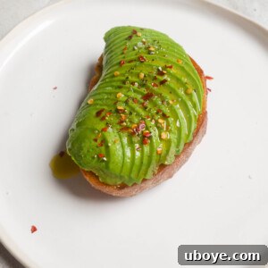 The finished ultimate avocado toast, ready to be enjoyed.
