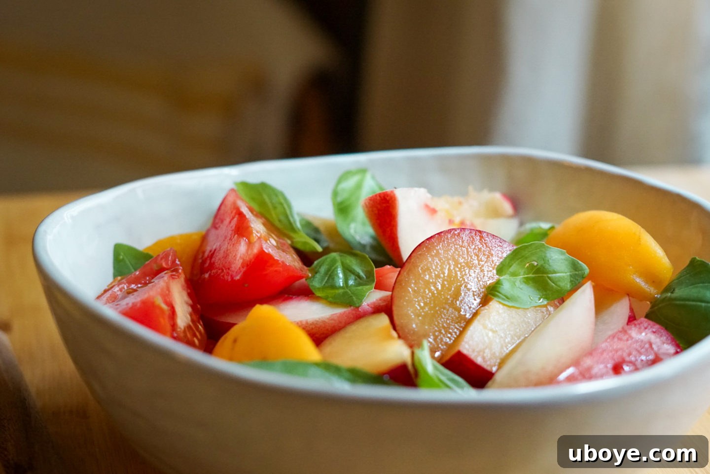 Sweet & Savory Stone Fruit, Tomato, and Basil Medley 4 Two bowls of Stone Fruit and Tomato Basil Salad, showcasing its vibrant colors
