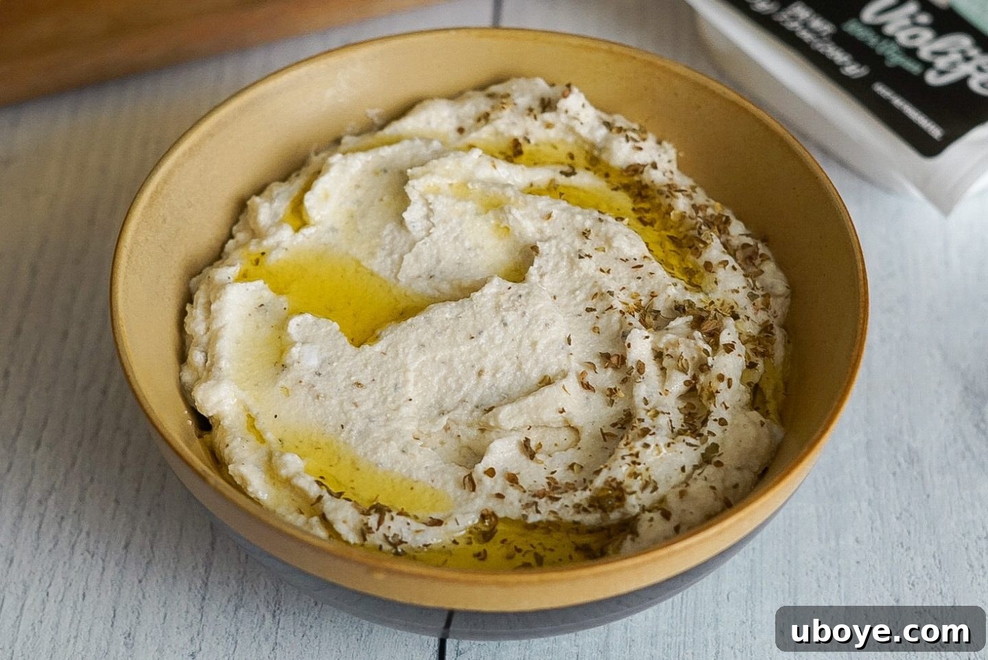 Close-up of creamy Vegan Whipped Feta in a food processor