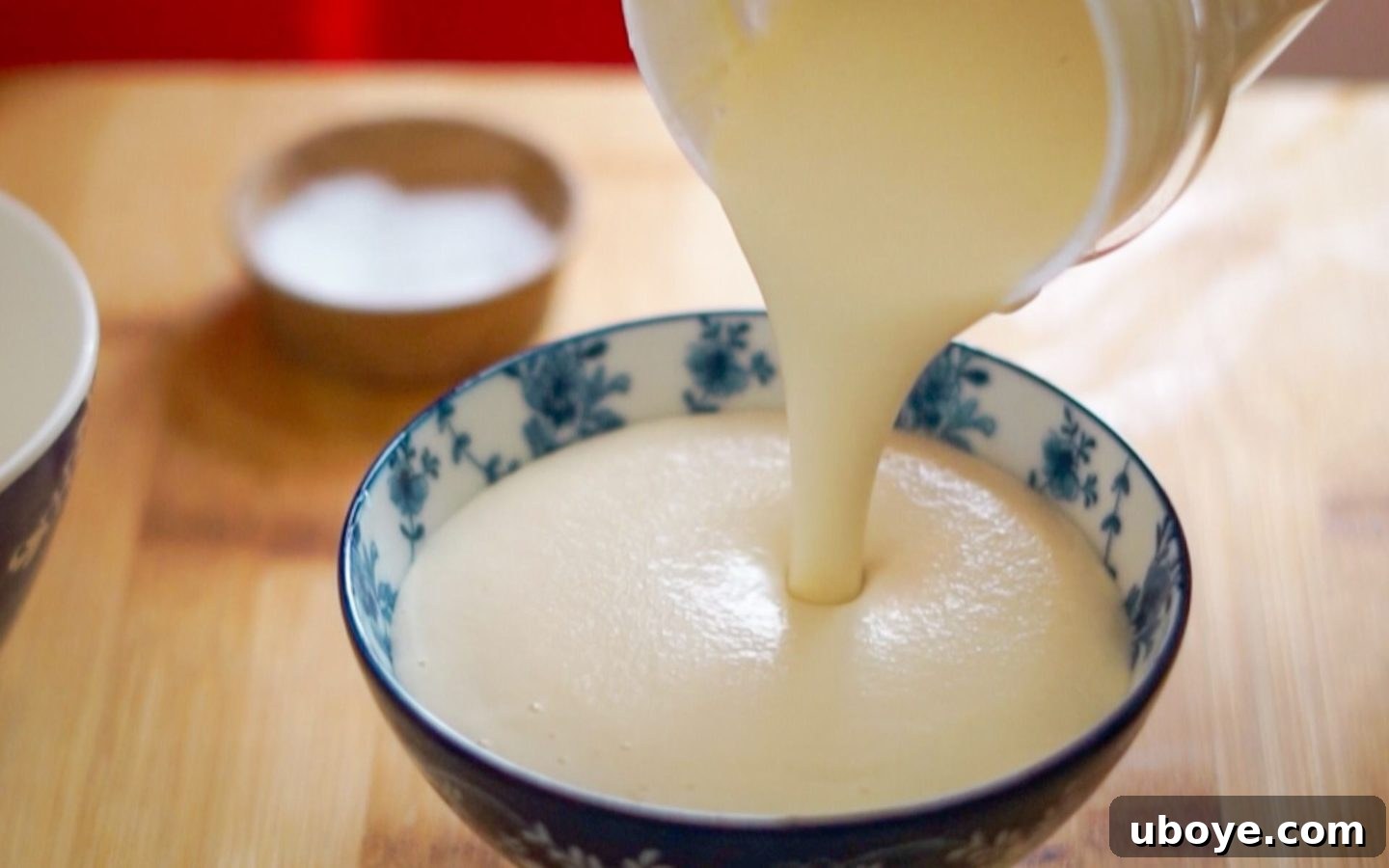 Close-up of vegan sour cream in a small bowl, showcasing its thick and creamy texture after chilling