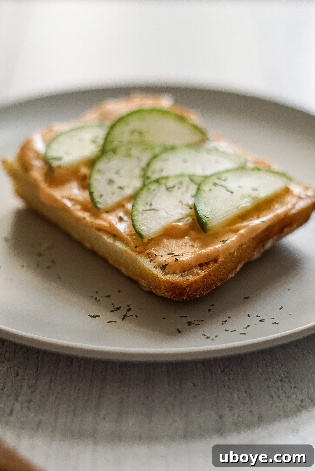Vegan Scandinavian smoked roe spread on toast with cucumber and dill