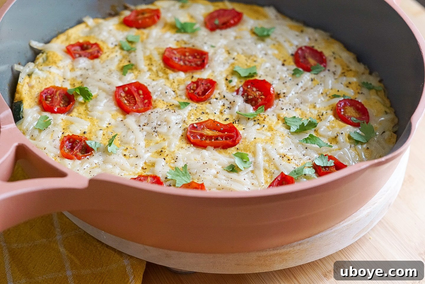 Easy Vegan Skillet Frittata 2 Delicious vegan frittata with vegetables and cheese, ready to be served for brunch or meal prep.