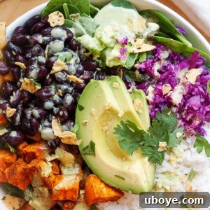 sweet potato and back bean nourish bowl in a white dish