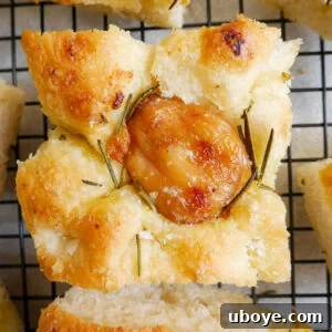 A beautifully baked garlic and rosemary focaccia loaf