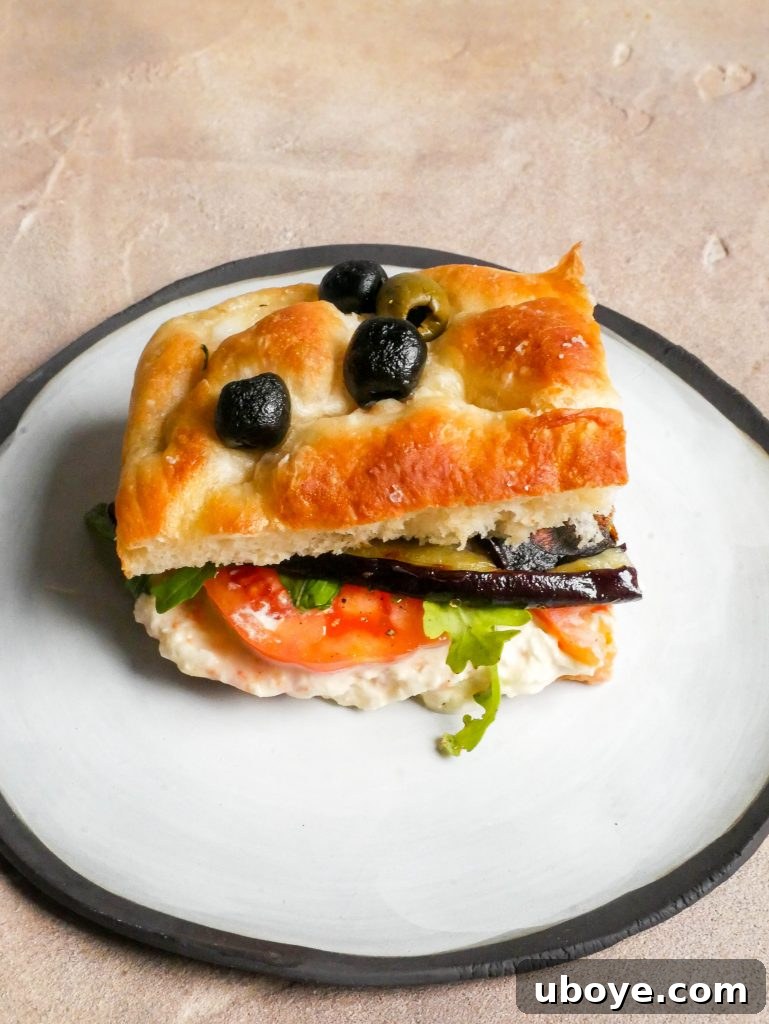 Close-up of a freshly made Crispy Eggplant Focaccia Sandwich
