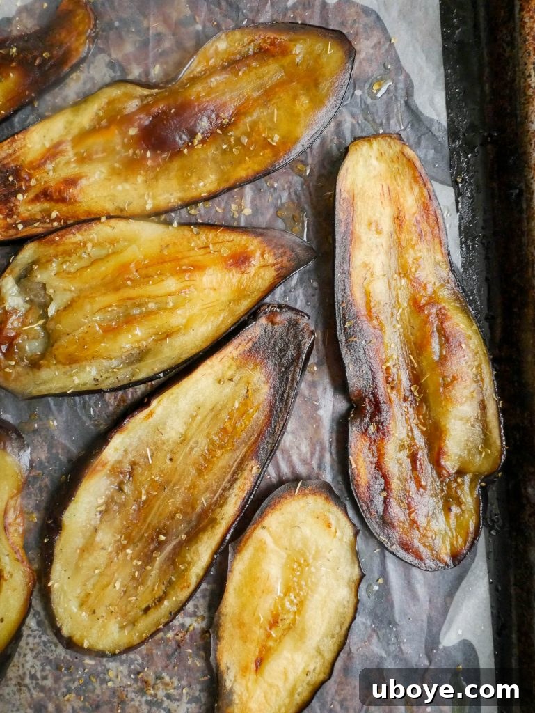 Eggplant slices being prepared for baking into crispy chips
