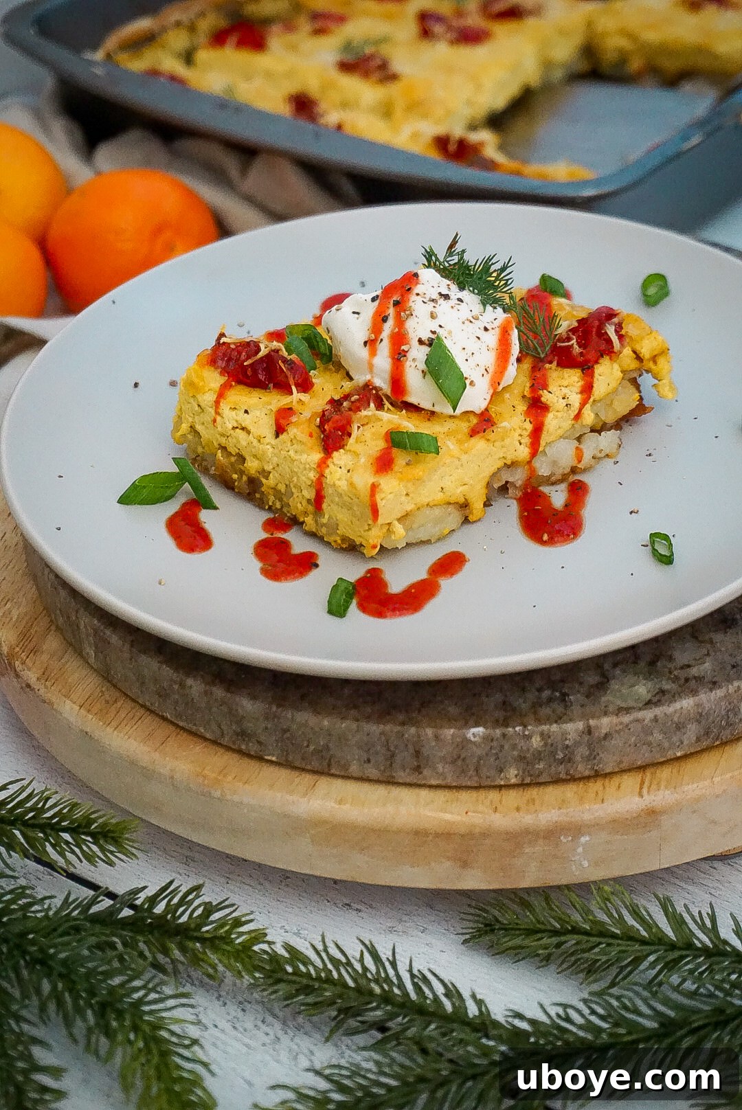 A slice of the cheesy vegan breakfast casserole ready to be served