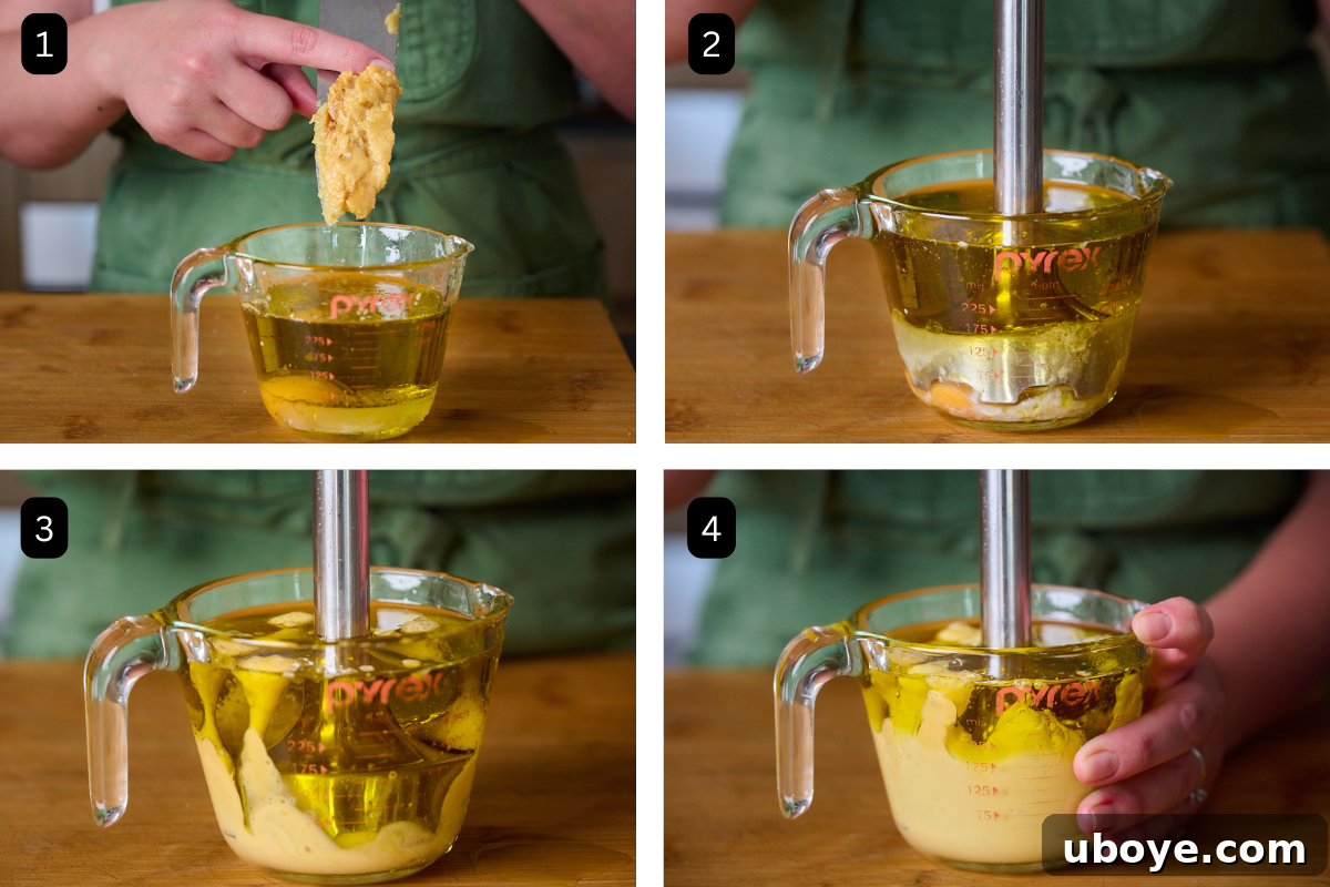 Four images showing the steps of how garlic confit aioli is made. The first image is the garlic going into a glass jar with the olive oil and egg. The second, third and fourth images are the aioli being blended together with an immersion blender. 