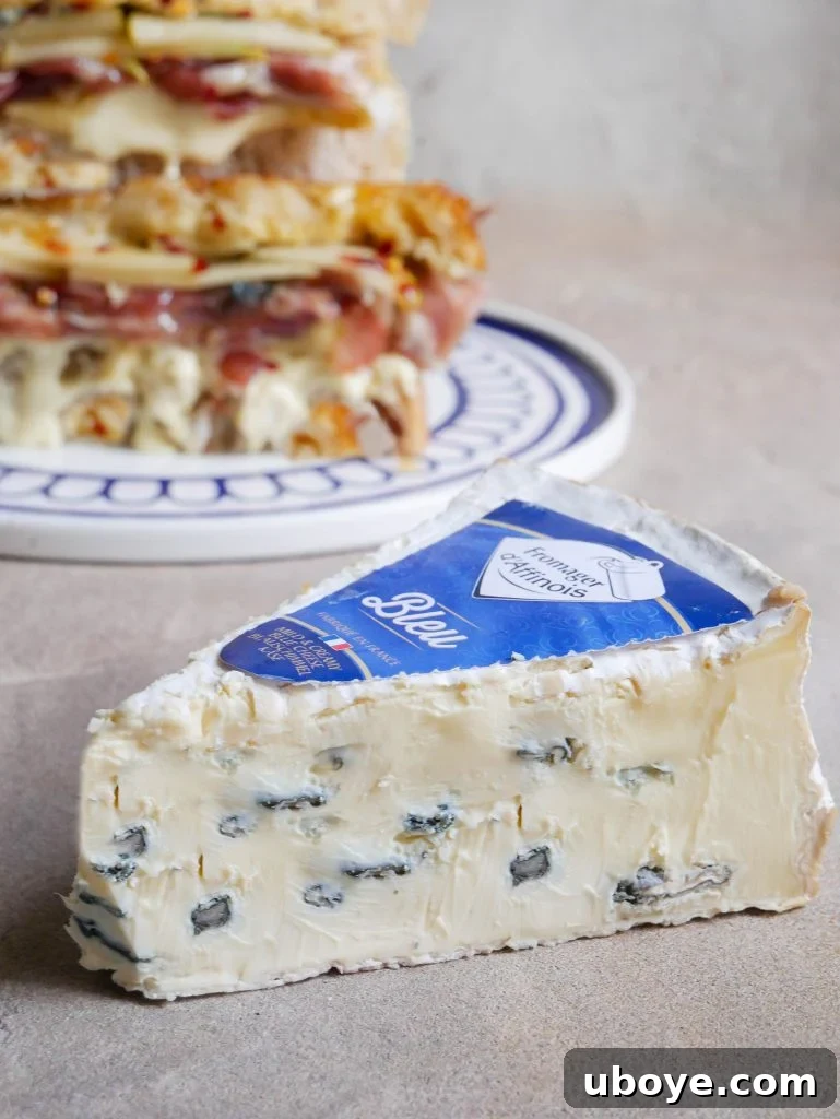 Close-up of Triple Cream Brie & Hot Honey Toastie revealing creamy blue cheese and pear