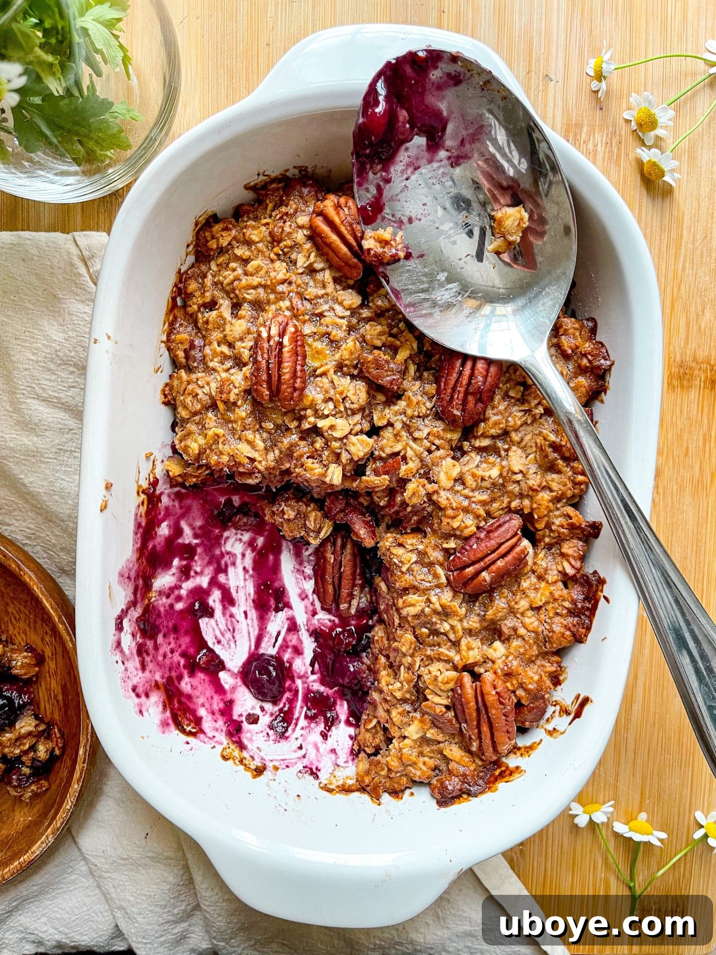 A close-up of the blueberry breakfast crumble, emphasizing the rustic texture of the oat topping.