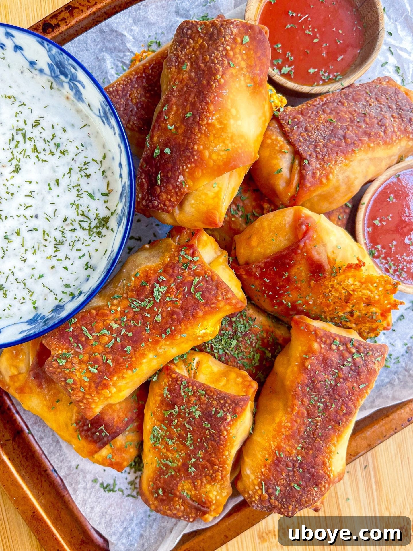 Closeup of crispy vegan chicken eggrolls with a vibrant filling