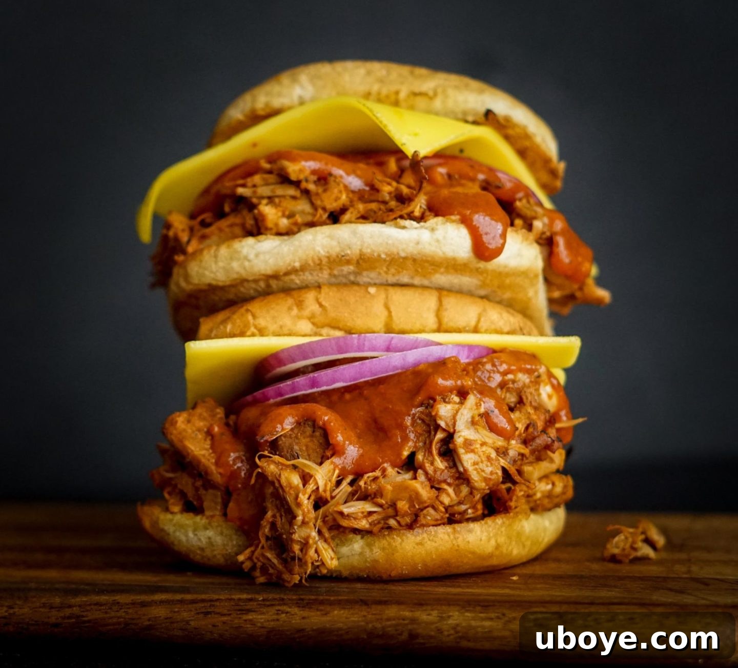 Plant-Powered BBQ Jackfruit Stacks 2 bbq sandwich on a wood cutting board
