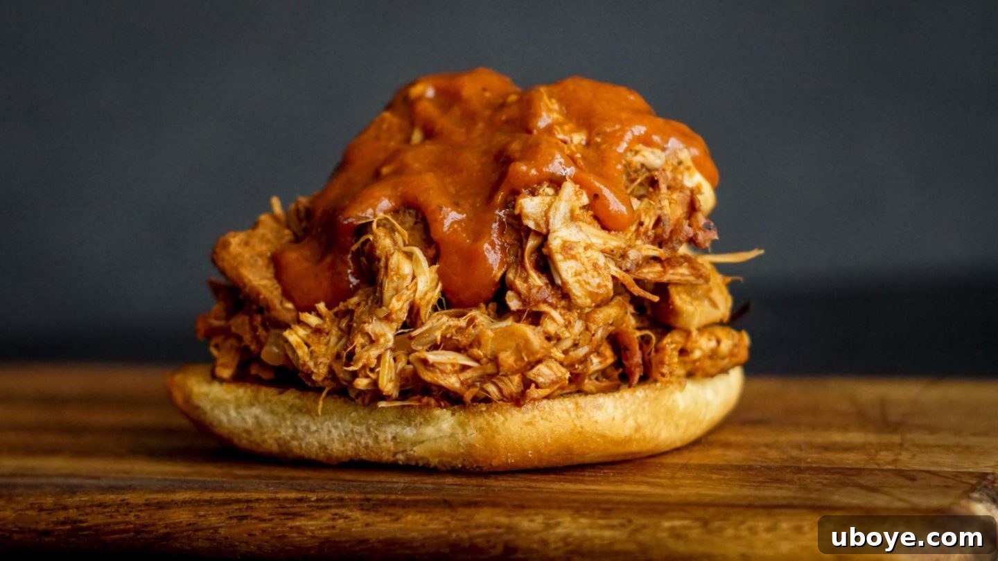 Plant-Powered BBQ Jackfruit Stacks 3 bbq chicken sandwich on a cutting board