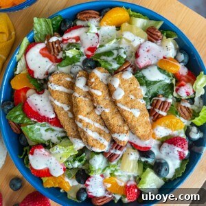 Strawberry Poppyseed and Chicken Salad with dressing drizzle