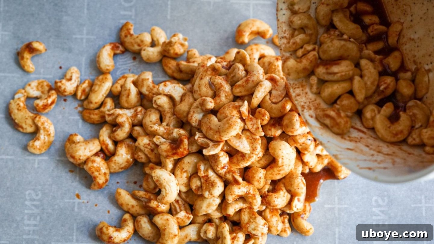 Perfectly roasted chili lime cashews, glistening with flavor and ready to be served as a delightful snack.