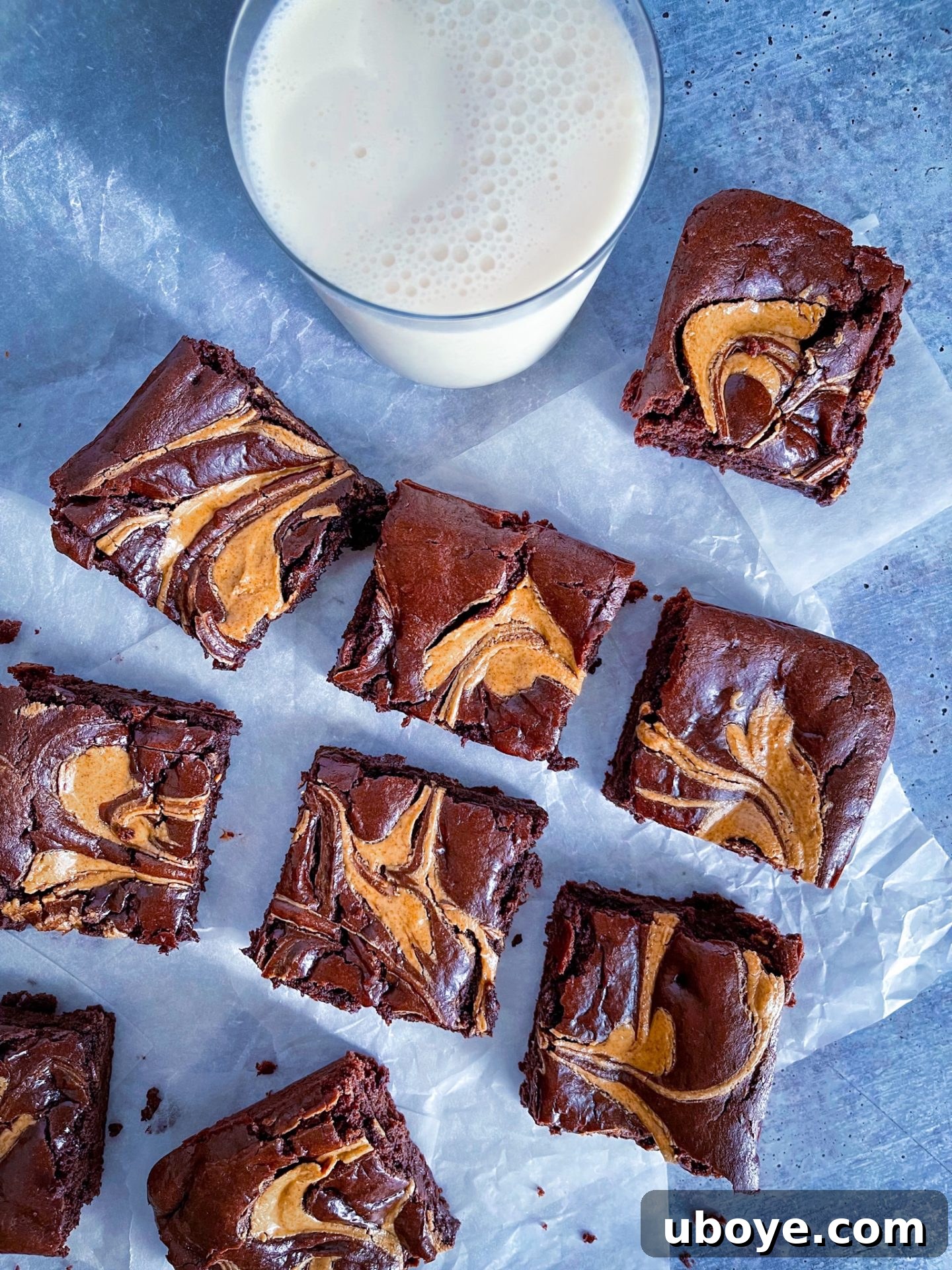 Fudgy vegan brownies with a beautiful salted almond butter swirl on top, a perfect one-bowl dessert