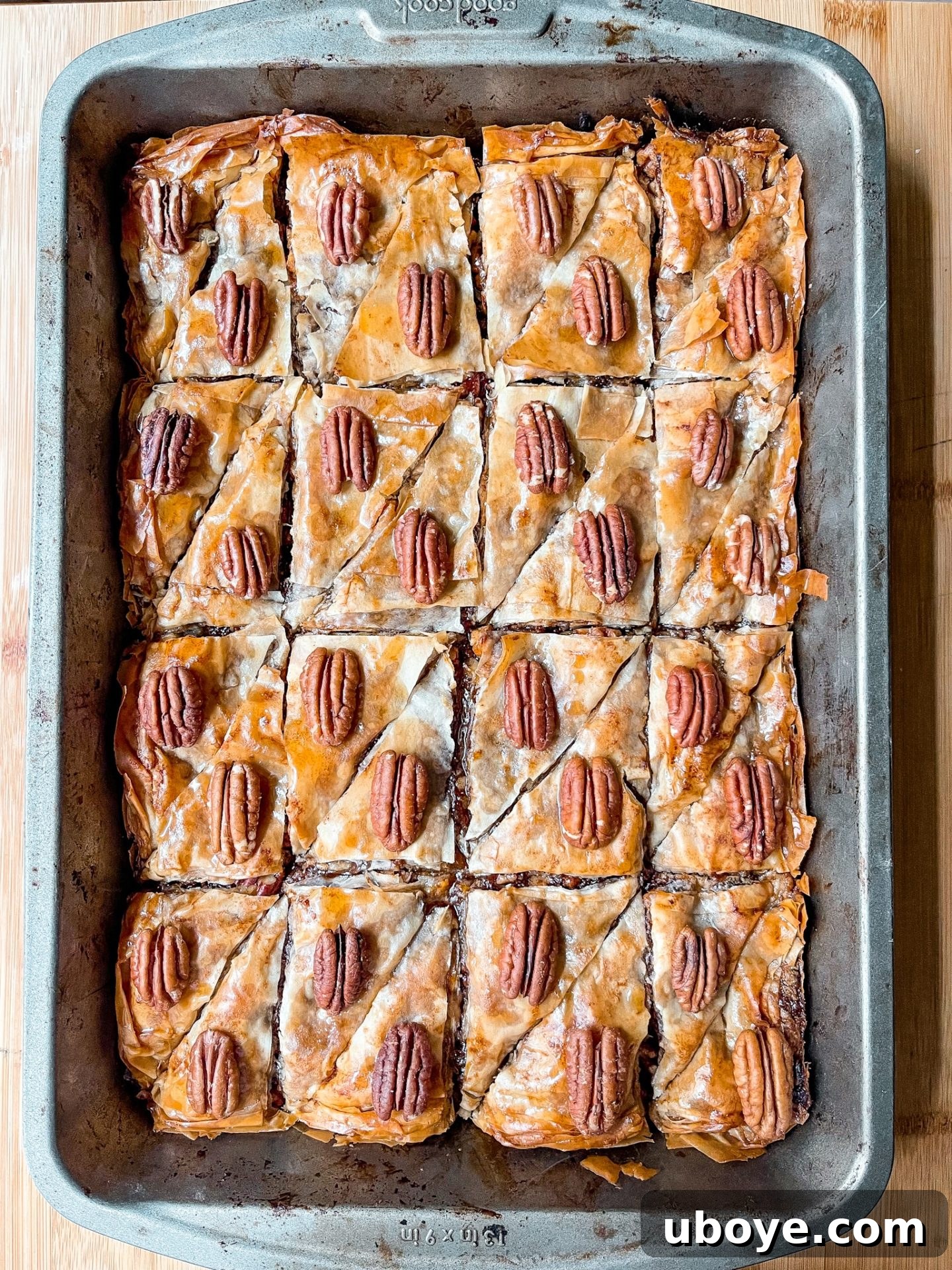 Maple Kissed Pumpkin Pecan Vegan Baklava 2 Delicious Vegan Pumpkin Pecan Baklava with a golden-brown crust and maple glaze