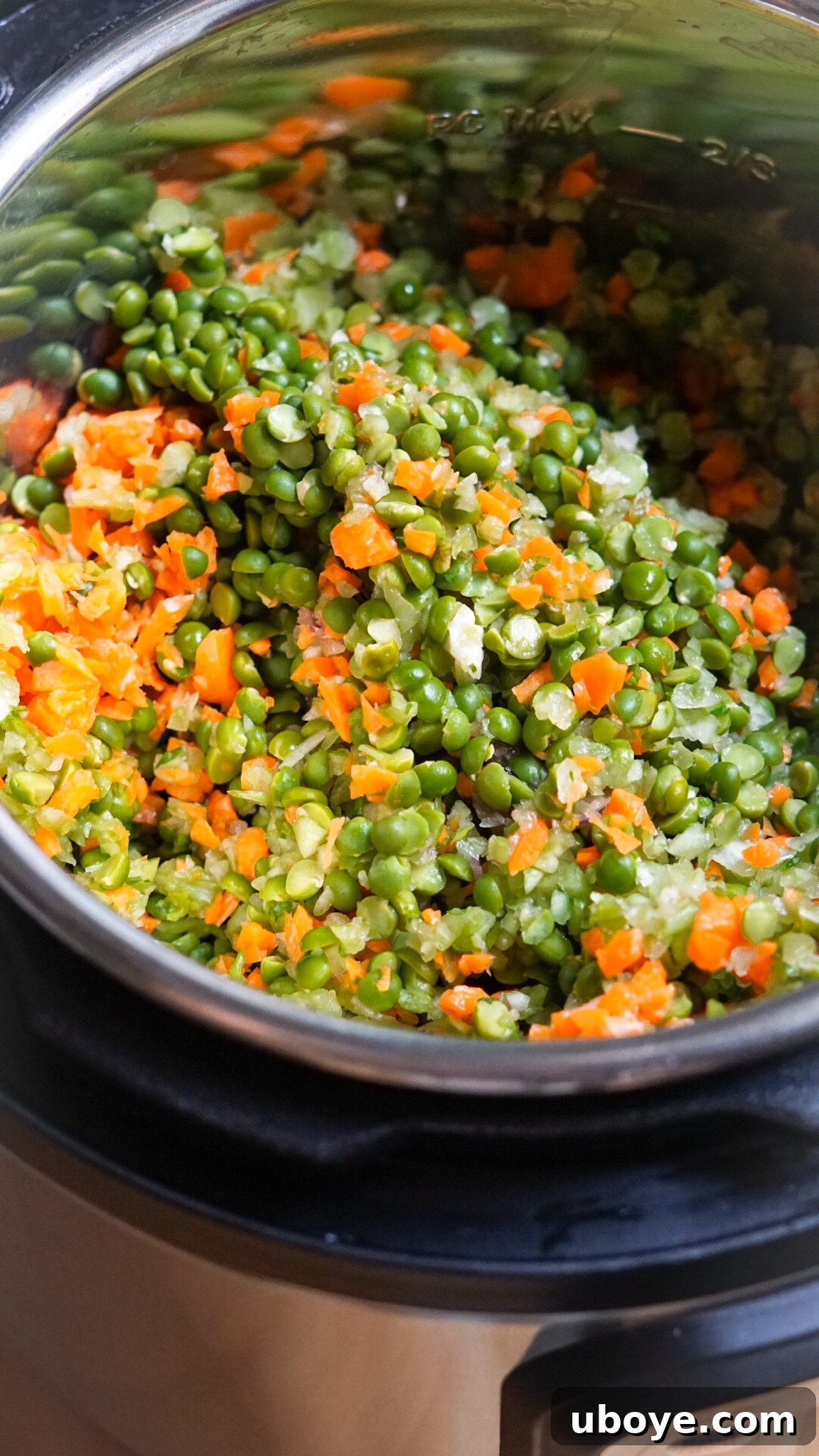 Dried split peas, chopped carrots, and celery waiting to be cooked in an Instant Pot.