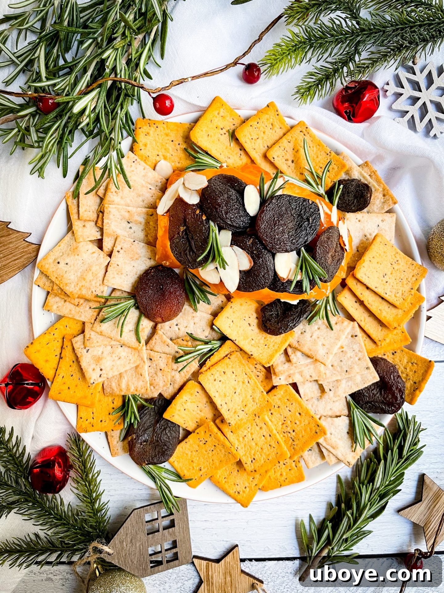 Delicious Vegan Cream Cheese Dip with apricot jam and rosemary, served with crackers