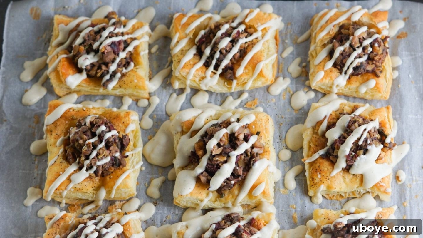 Vegan puff pastry tarts with mushroom filling and creamy cashew sauce
