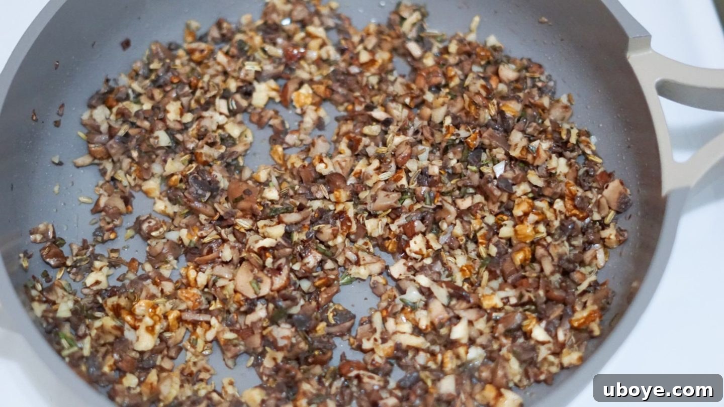 Vegan mushroom and walnut filling with garlic and rosemary, ready for the tarts