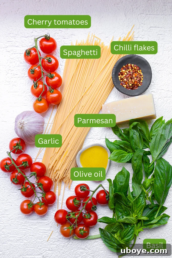Garden Fresh Cherry Tomato Basil Pasta 3 A flat lay photograph showcasing the fresh, raw ingredients needed for cherry tomato and basil pasta: vibrant cherry tomatoes, a bunch of fresh basil, garlic cloves, and a bottle of olive oil.