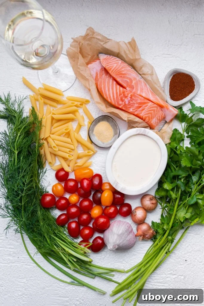 Tuscan Sunset Salmon Pasta 3 Fresh ingredients for creamy salmon Tuscan pasta laid out on a cutting board