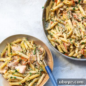 Creamy salmon Tuscan pasta, plated and ready to eat