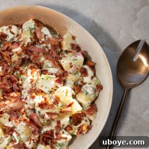 The best potato salad, garnished and ready