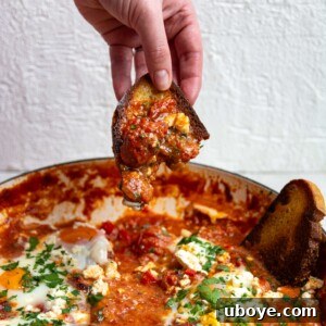 Baked eggs with chorizo and feta