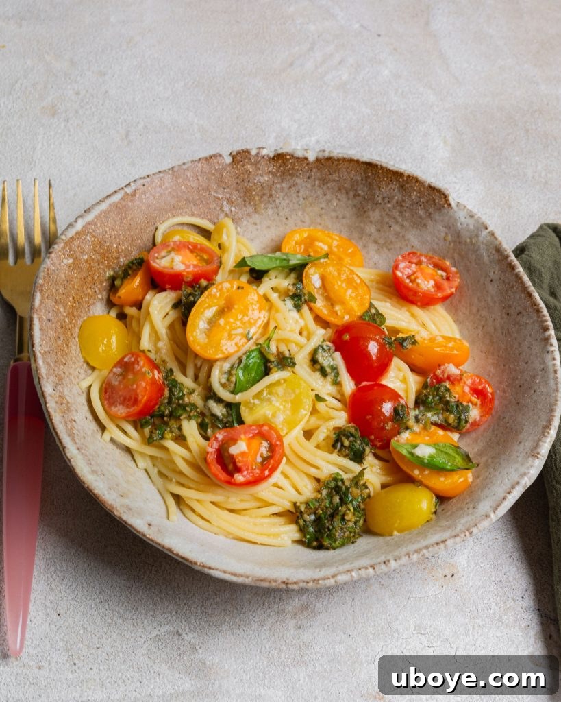Simple Summer Tomato Pasta 7 Close-up of freshly served no-cook tomato pasta with basil